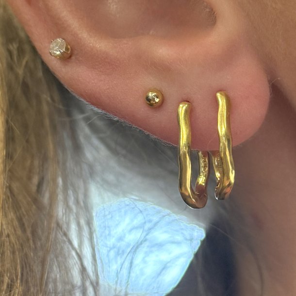 HOOP OVAL ASYM forgyldt s�lv