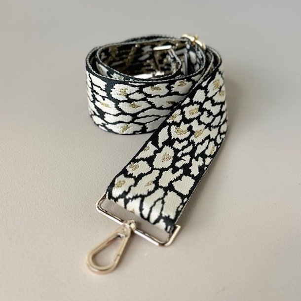 Taskerem golden leo guld