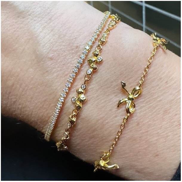 armbnd CURVE BOW  Forgyldt Slv