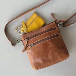 Lille pung med nglering skind