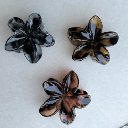 hrklemme med blomster