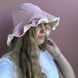 Solhat med bjelig kant