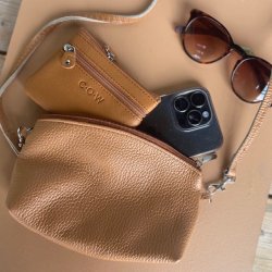 Clutch / crossbody skind