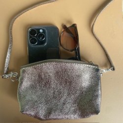 Clutch / crossbody skind