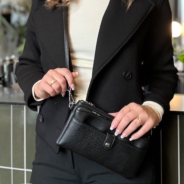 Clutch med crossbody rem