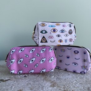 Toilettaske eyes mellem