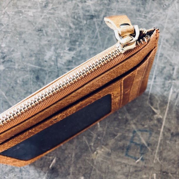 Kortpung med lynls skind