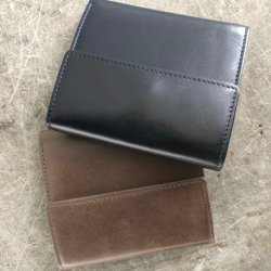 Tre-fljet pung skind