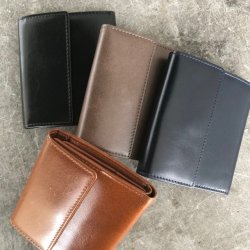 Tre-fljet pung skind