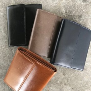 Tre-fljet pung skind