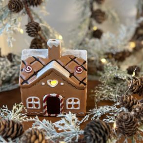 Hus til fyrfadslys keramik