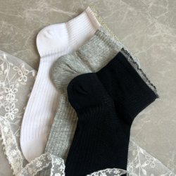 Str�mpe med glitter kant 