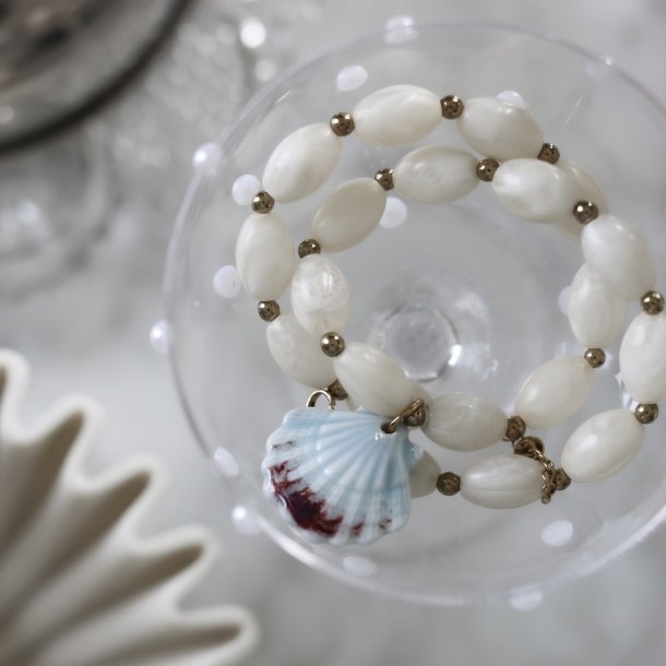 Halsk�de med musling