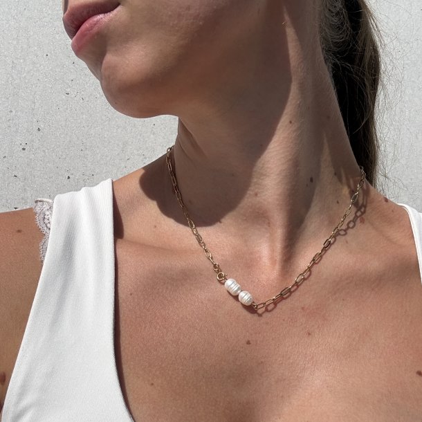 Halsk�de link pearl vandfast