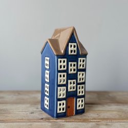 Hus til fyrfadslys bl keramik