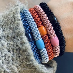 Hrelastikker knyttet solid