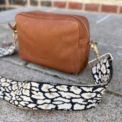 Taskerem golden leo guld