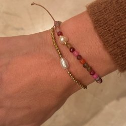 Armbnd med guld perler