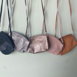 Clutch / crossbody skind