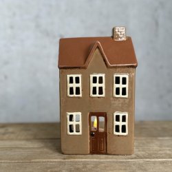 Hus til fyrfadslys brun