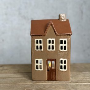 Hus til fyrfadslys brun