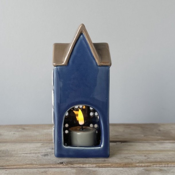 Hus til fyrfadslys bl keramik