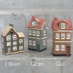 Hus til fyrfadslys keramik