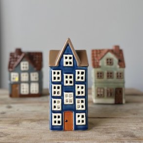 Hus til fyrfadslys bl keramik