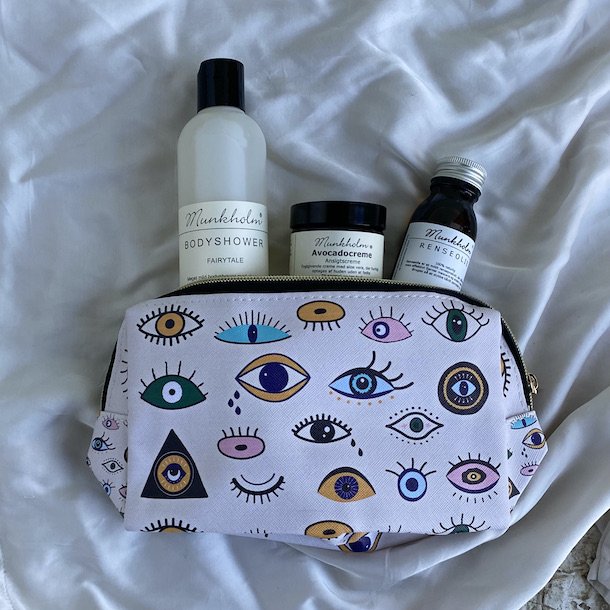 Toilettaske eyes mellem