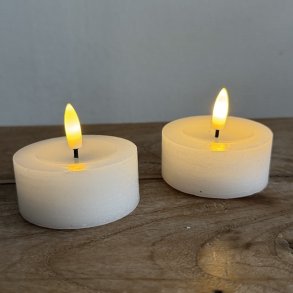 Store hvide LED fyrfadslys 2 stk. dia: 7 cm