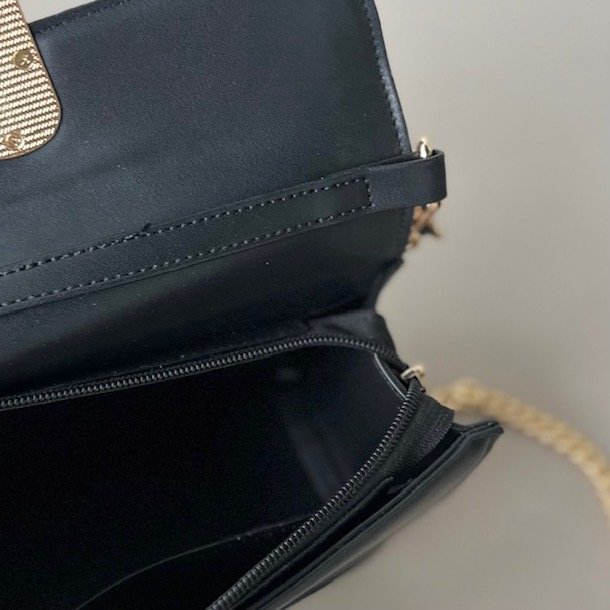 Crossbody med ovalt spnde