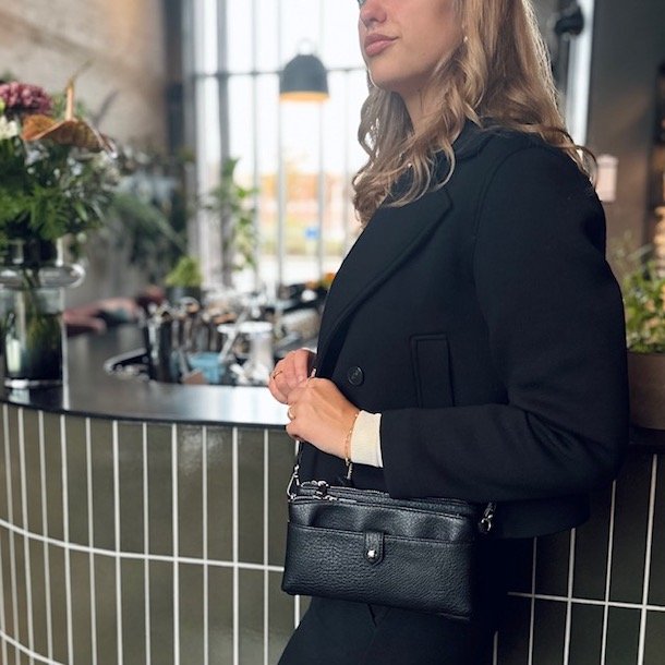 Clutch med crossbody rem