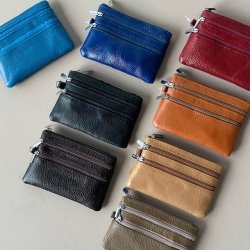 Manhattan pung med hndledrem Skind