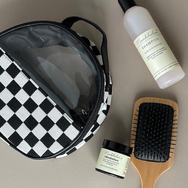 Rund toilettaske tern