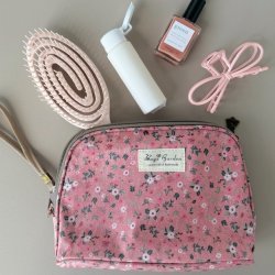 Toilettaske flora mellem blomst