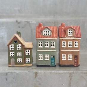 Hus til fyrfadslys keramik