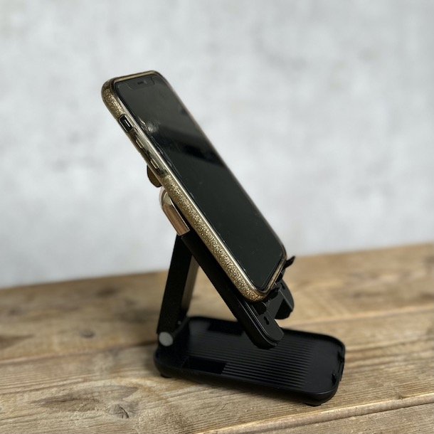 Sammenklaplig bordstander til telefon