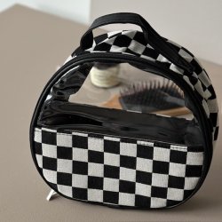 Rund toilettaske tern