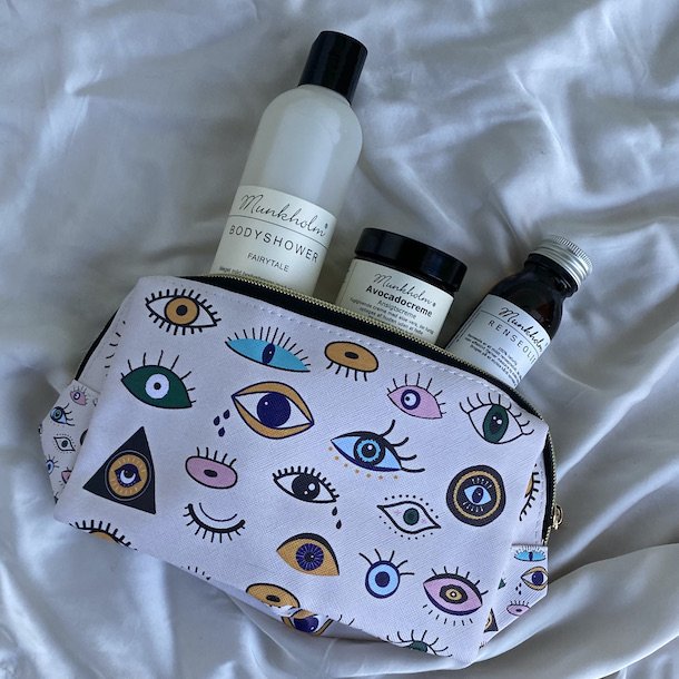 Toilettaske eyes mellem