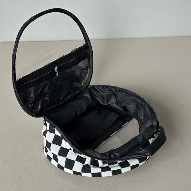 Rund toilettaske tern