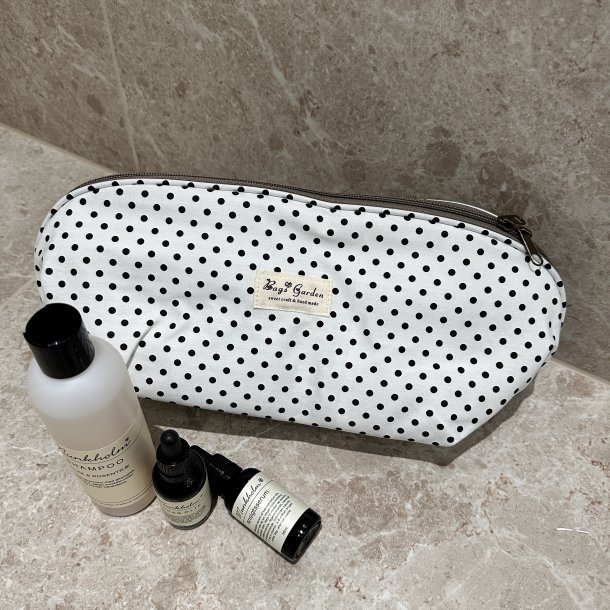 Stor toilettaske med rum dotti